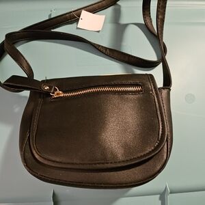 Small leather handbag with strap
